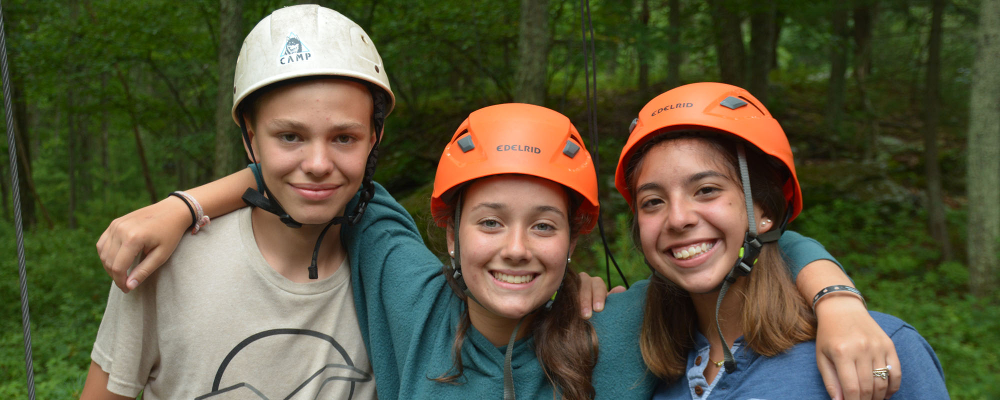 Campers participating in adventure activities