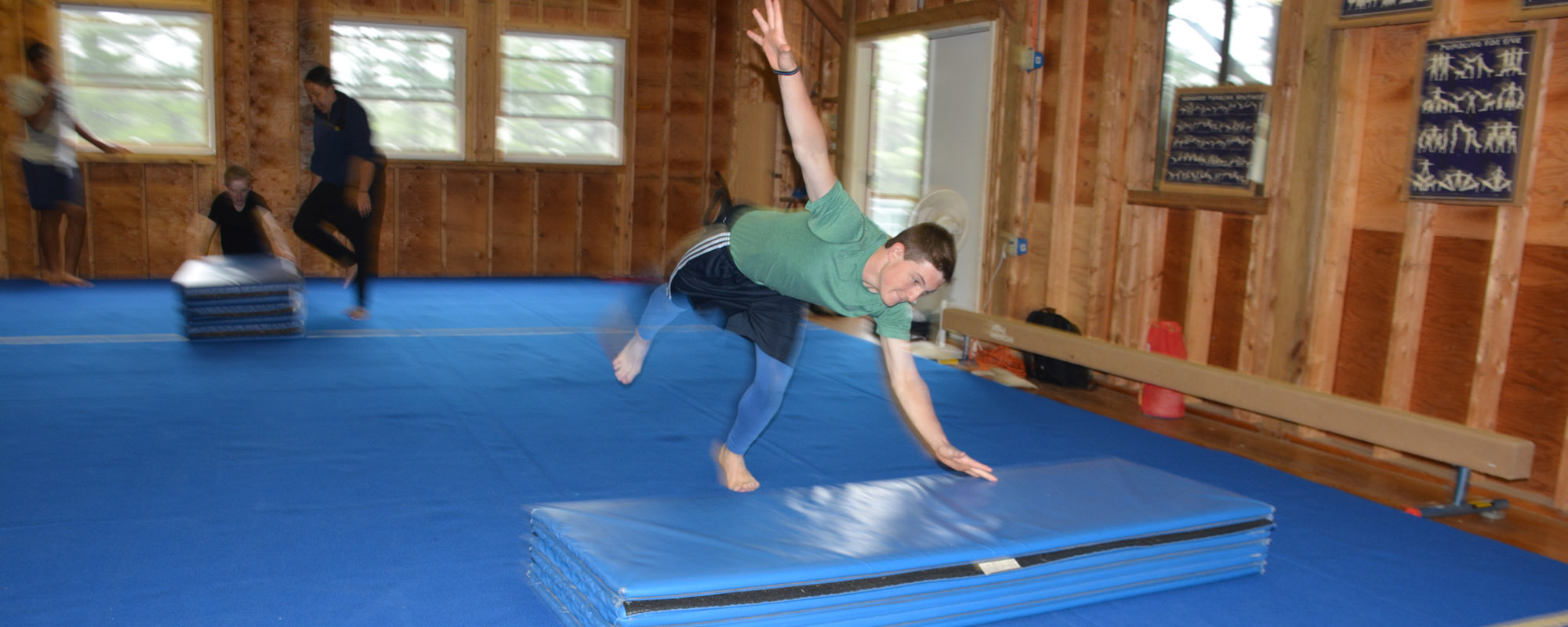 Boy performing somersault
